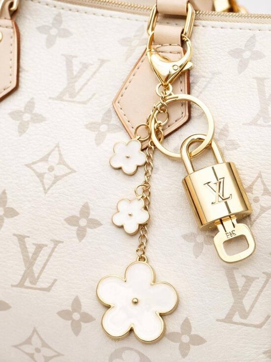 Louis Vuitton Accessories - LV Gold Padlock Authentic 🔑 Luxury Bag Charm w/ Unbranded Flower Keychain